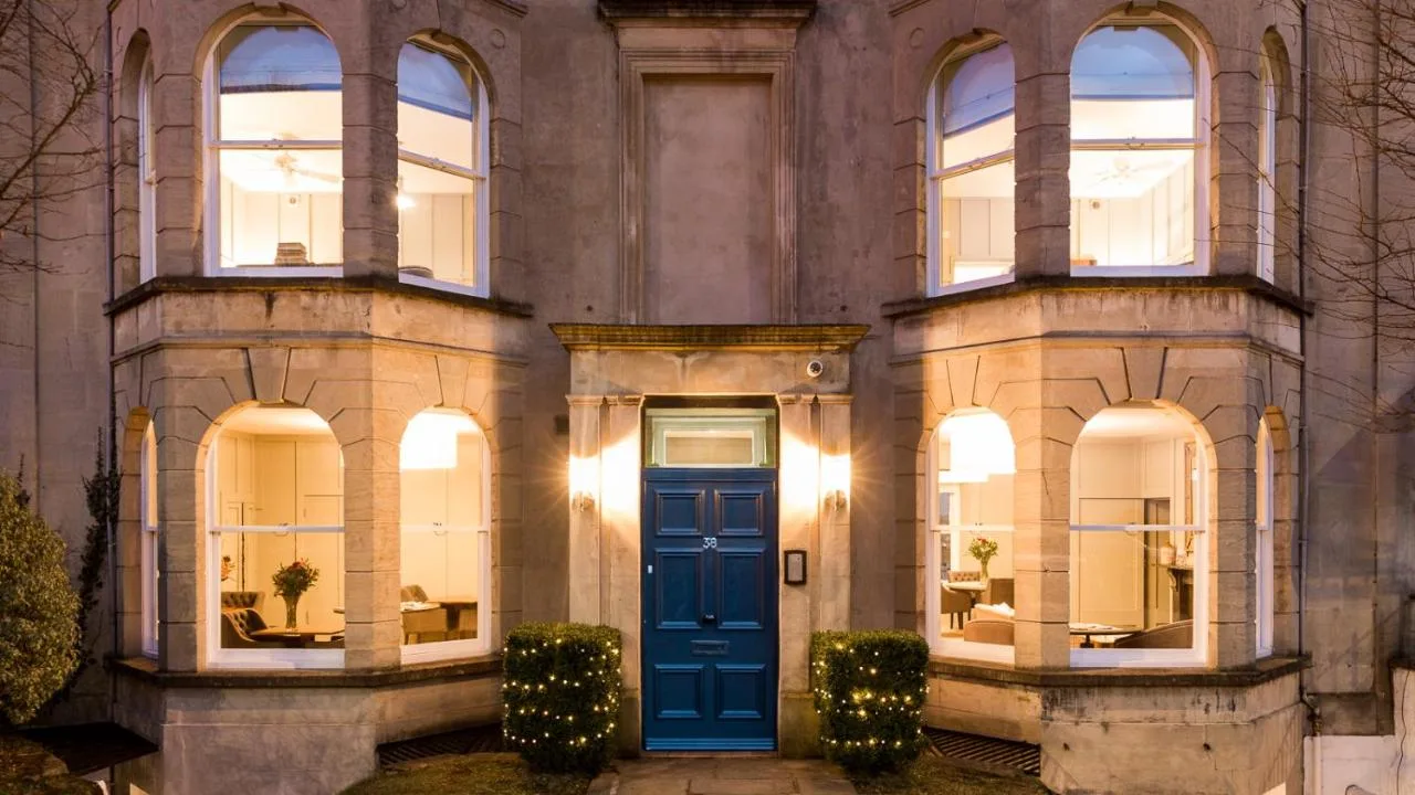 a building with a blue door in front at Number 38 Clifton in Bristol